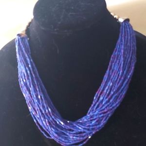 Blue seed bead multistrand necklace.